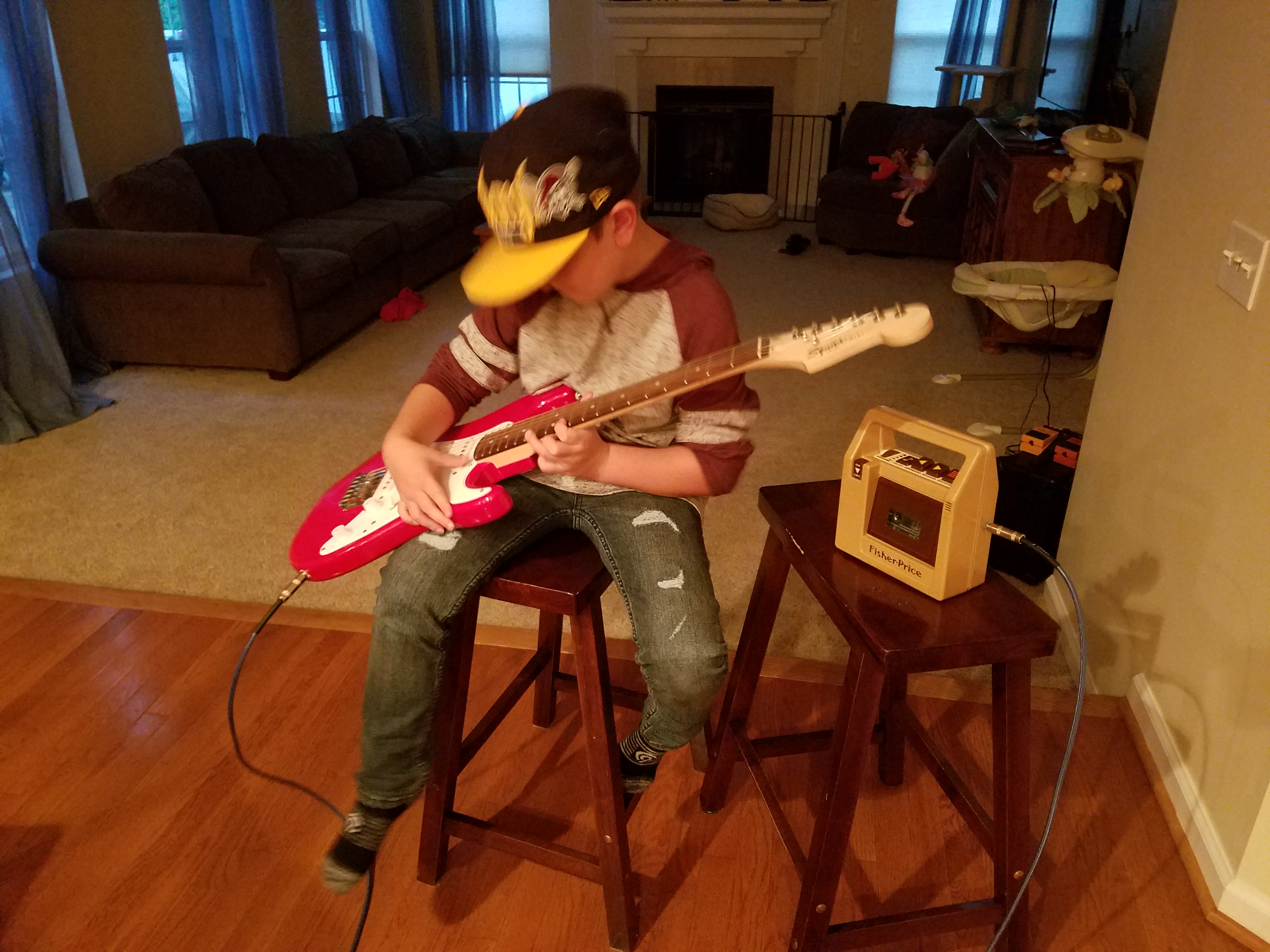You can’t tell from looking at the picture, but my son is trying to play the “Master of Puppets” riff here