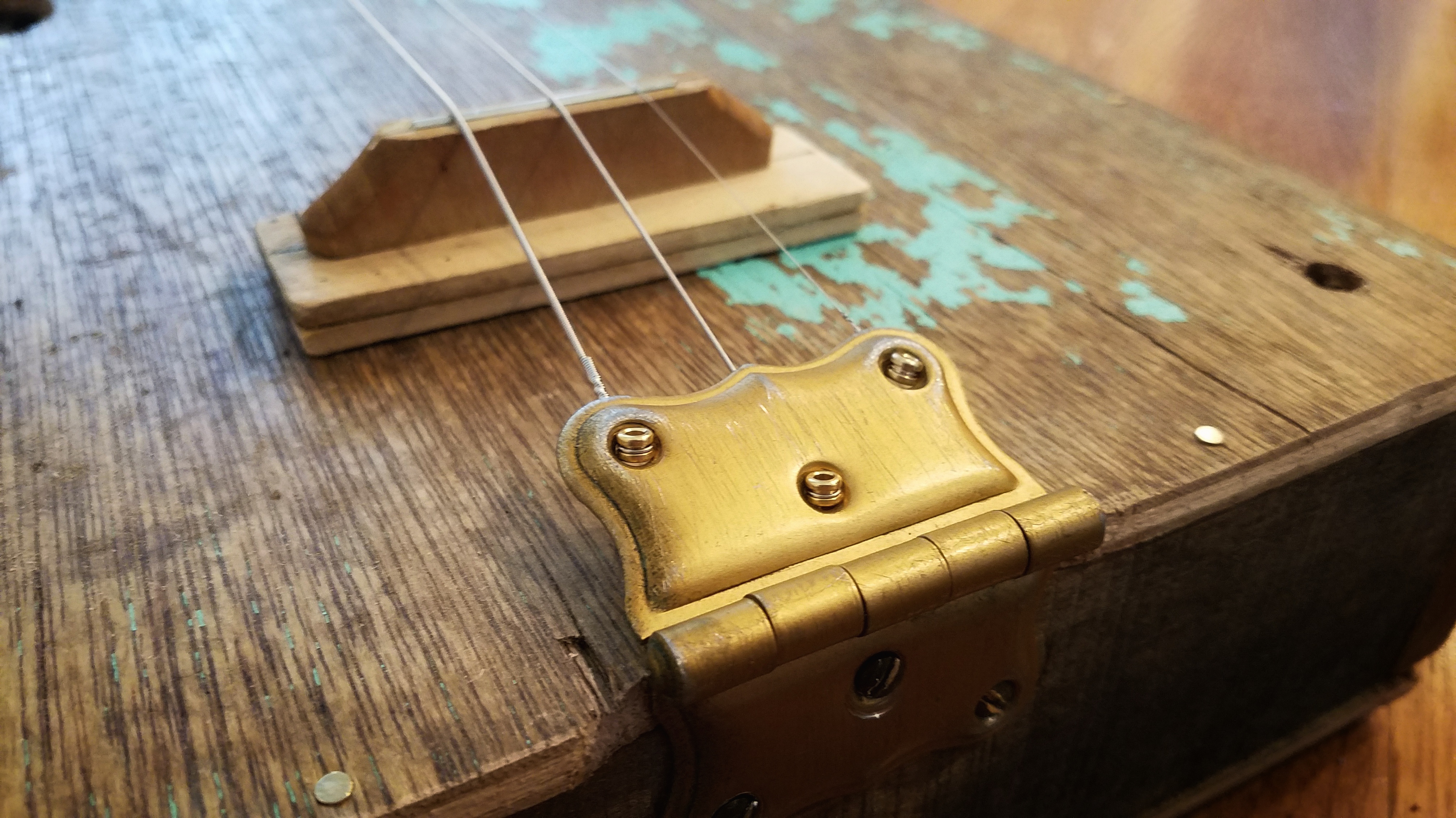 Old cabinet hinge, gently sanded to make it look a bit more worn