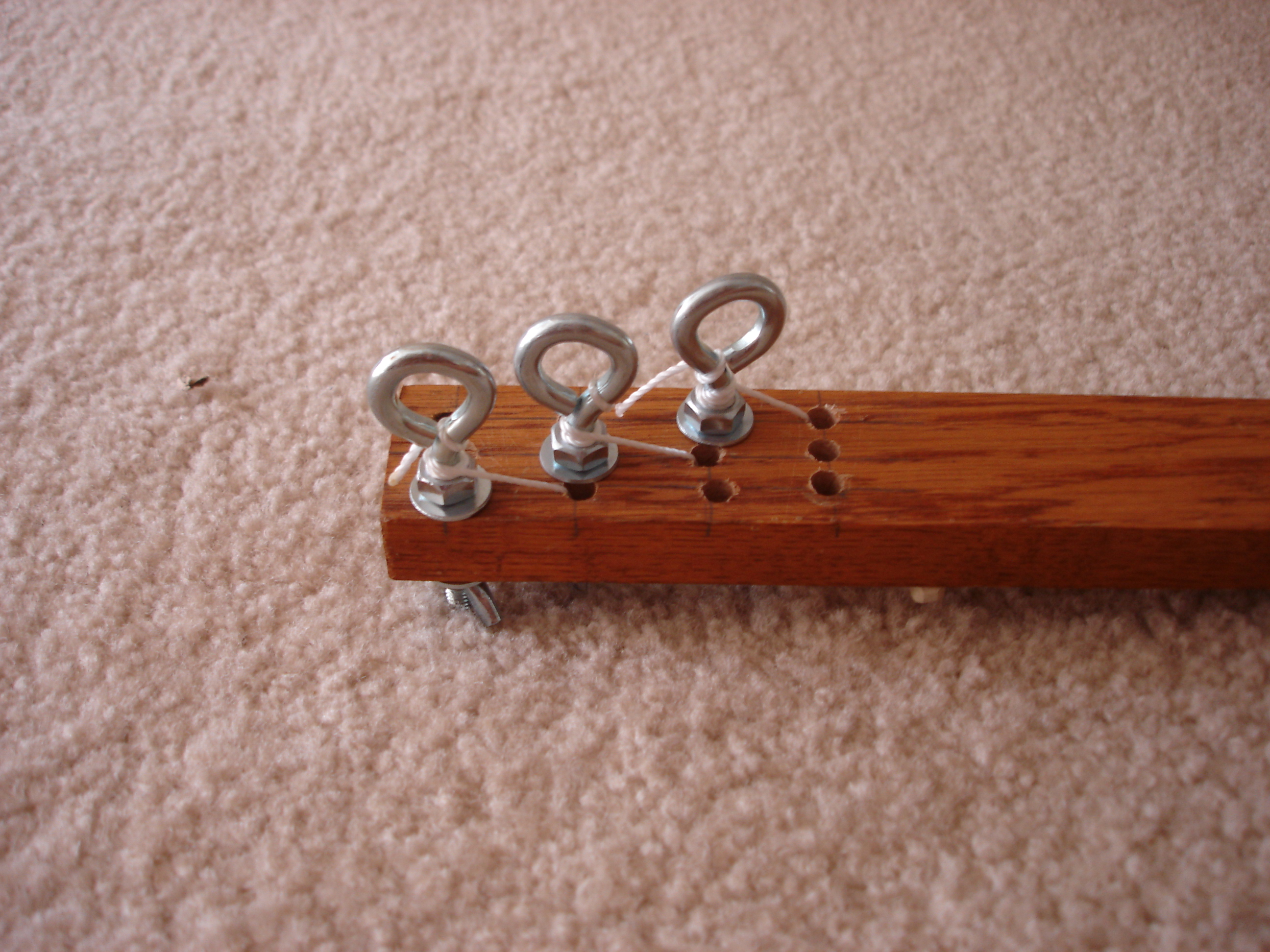 The reason there are so many holes is that I initially drilled them on the wrong side. As the saying goes, measure never, cut twice!