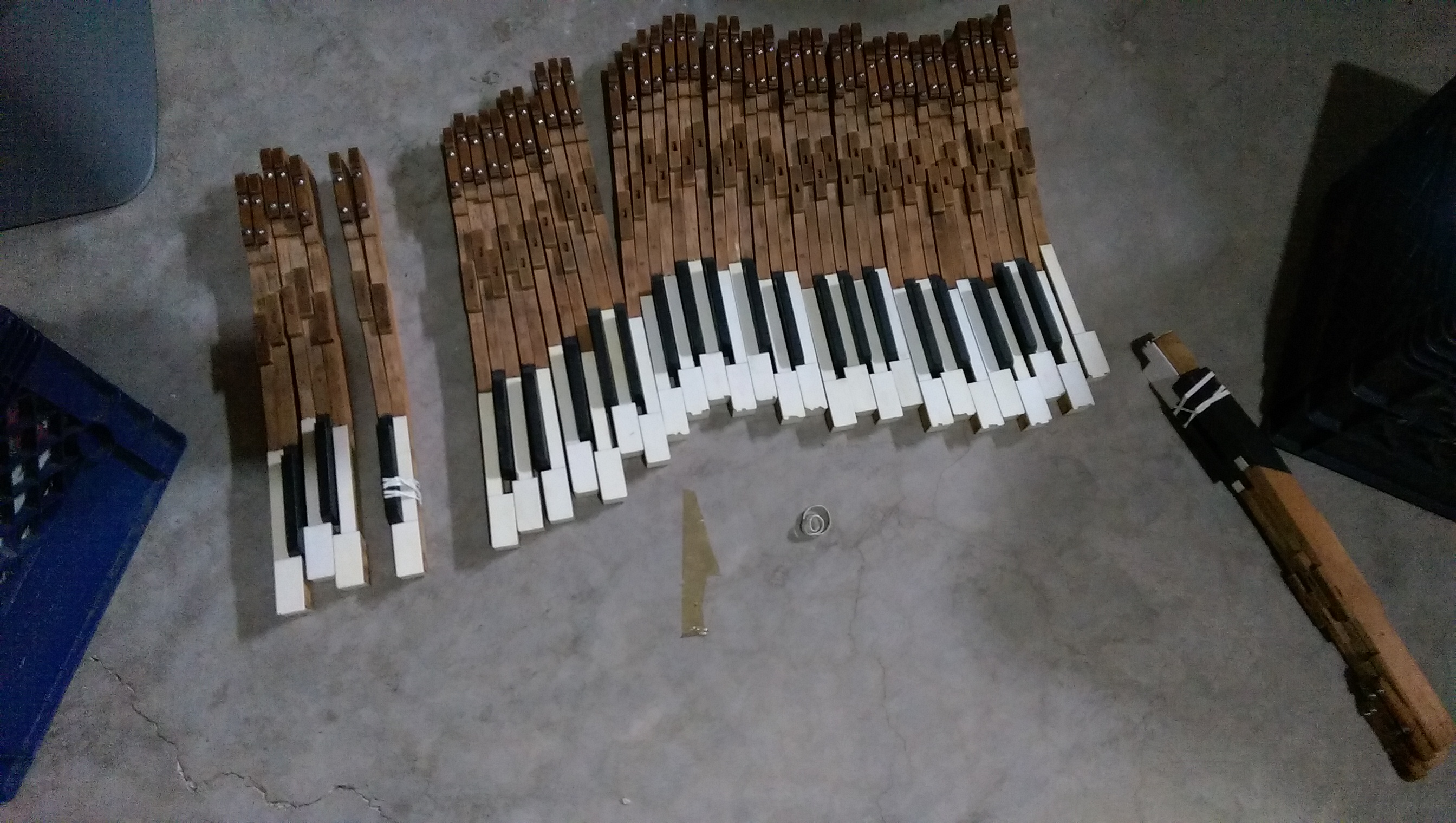 Making my wall display. I didn’t have clamps so I used rubber bands to glue together the pieces a few at a time, then weights to push together the larger pieces.