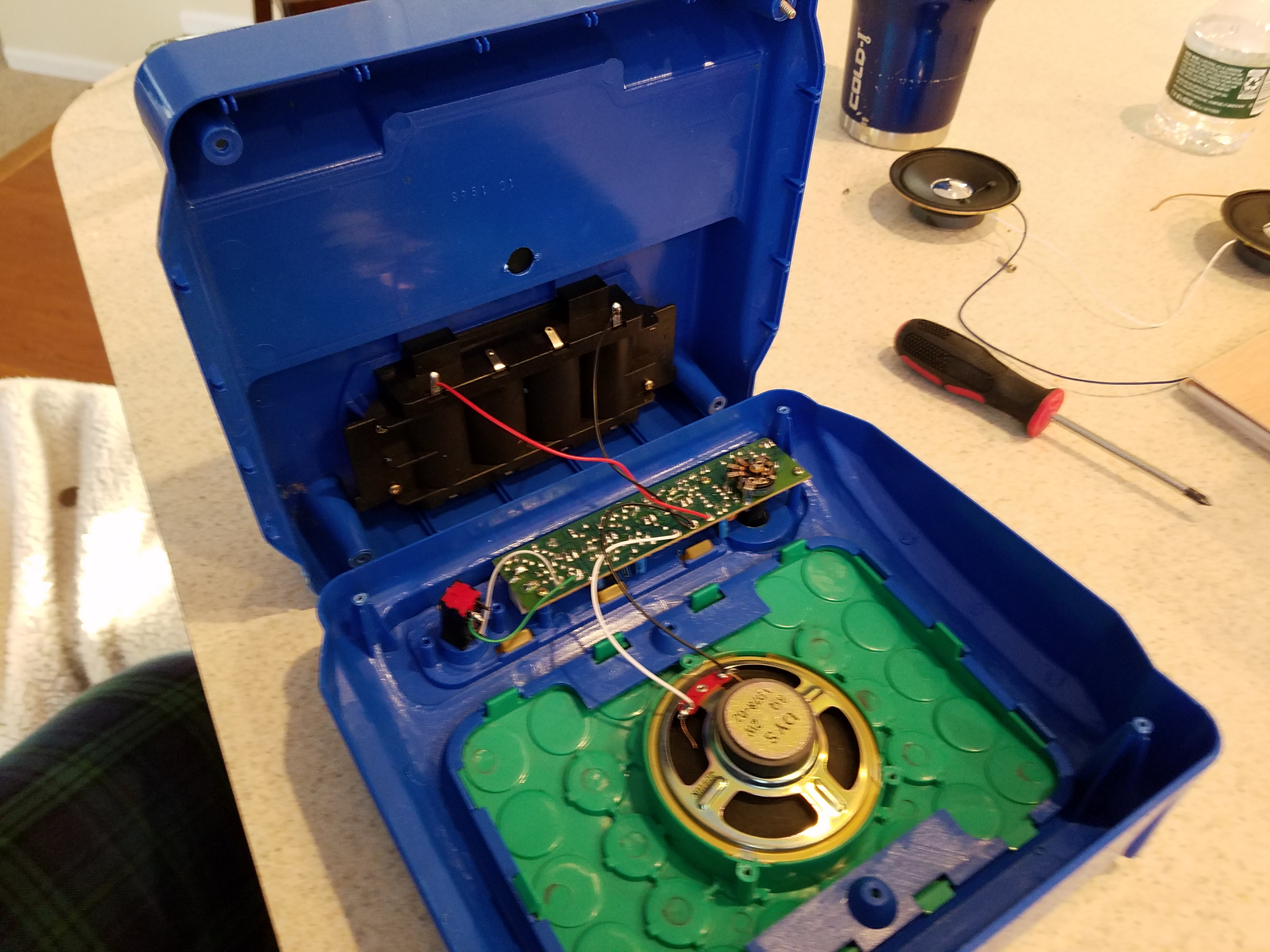 Not much to it…a small circuit board, a single speaker, and battery compartment…all were reused.