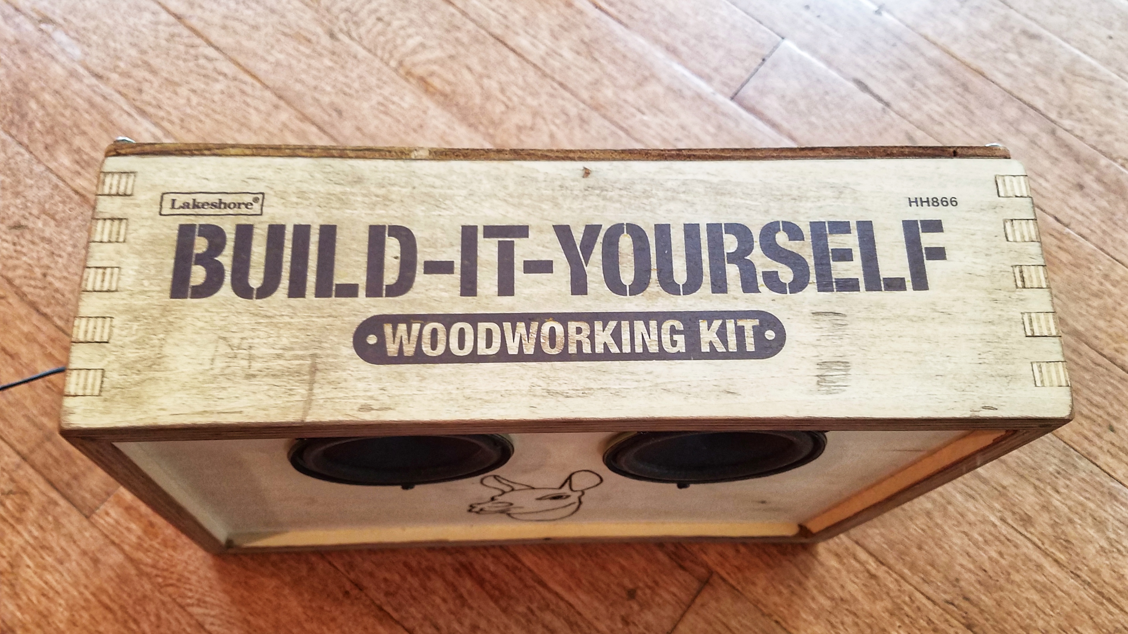 I used a bit of stain made with a steel wool dissolved in vinegar to give the box a roughed up look