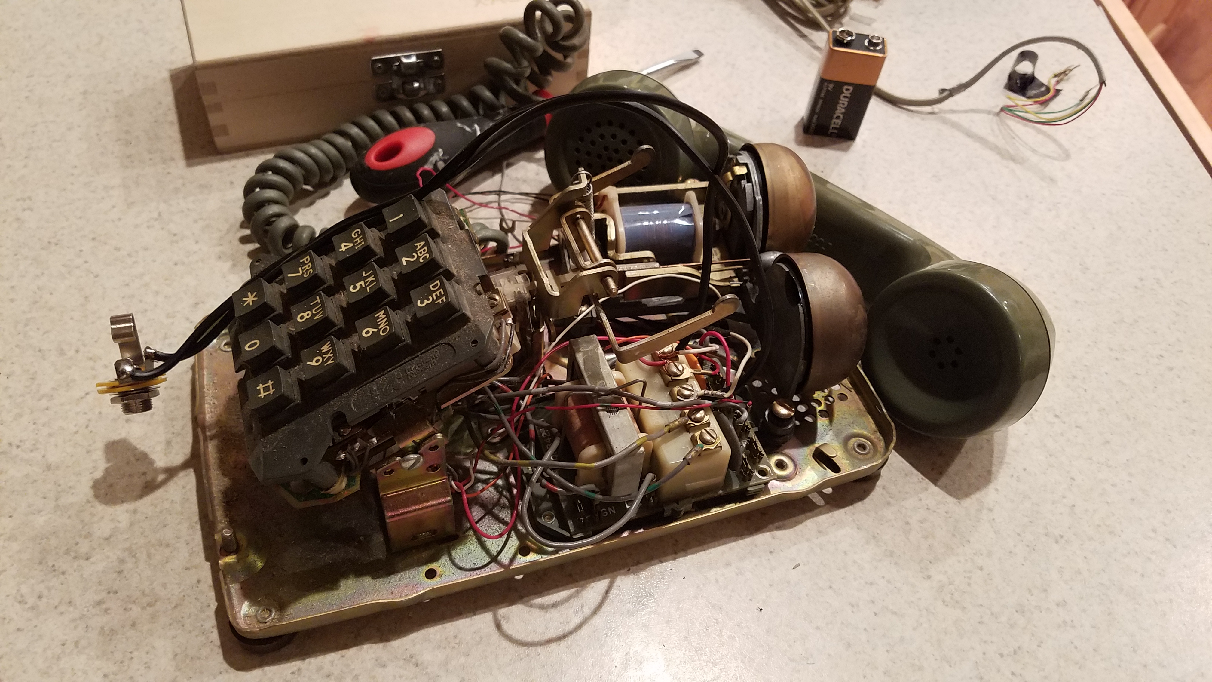 Hunting and pecking for the right wires to hook up a jack to.