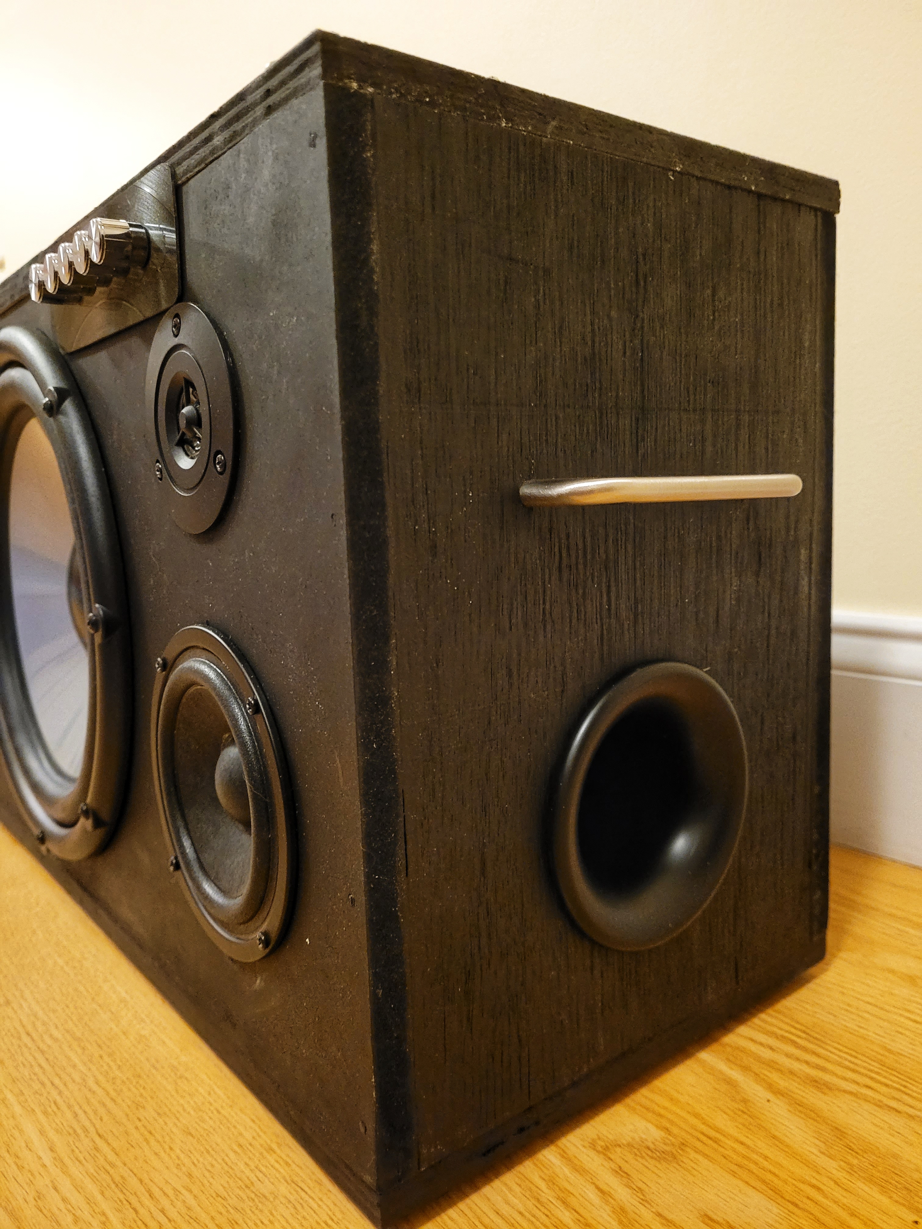 I reused the port from the subwoofer, which had been discarded