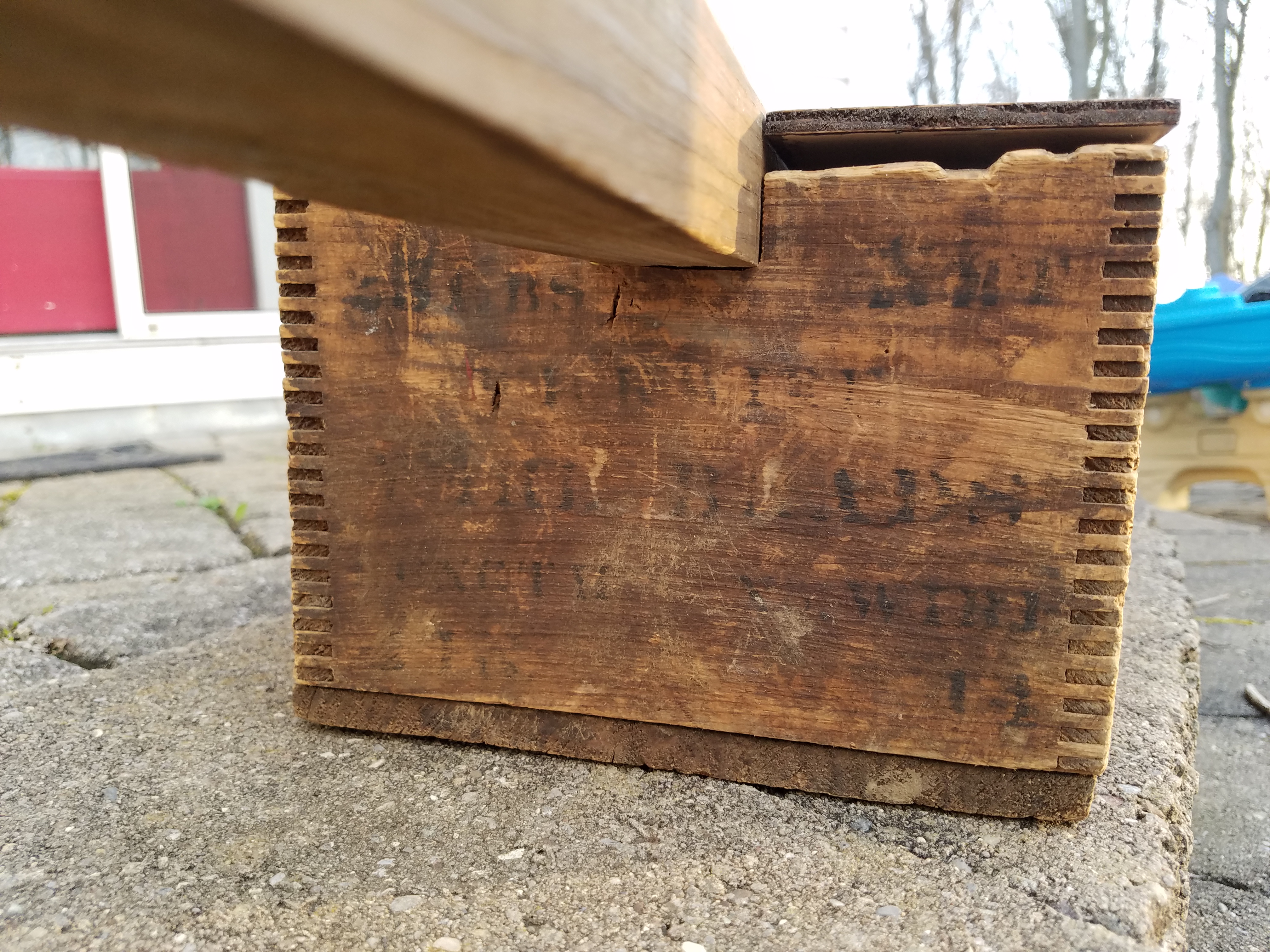 I love how the edge of the box was crumbling away. Also the unintelligible writing