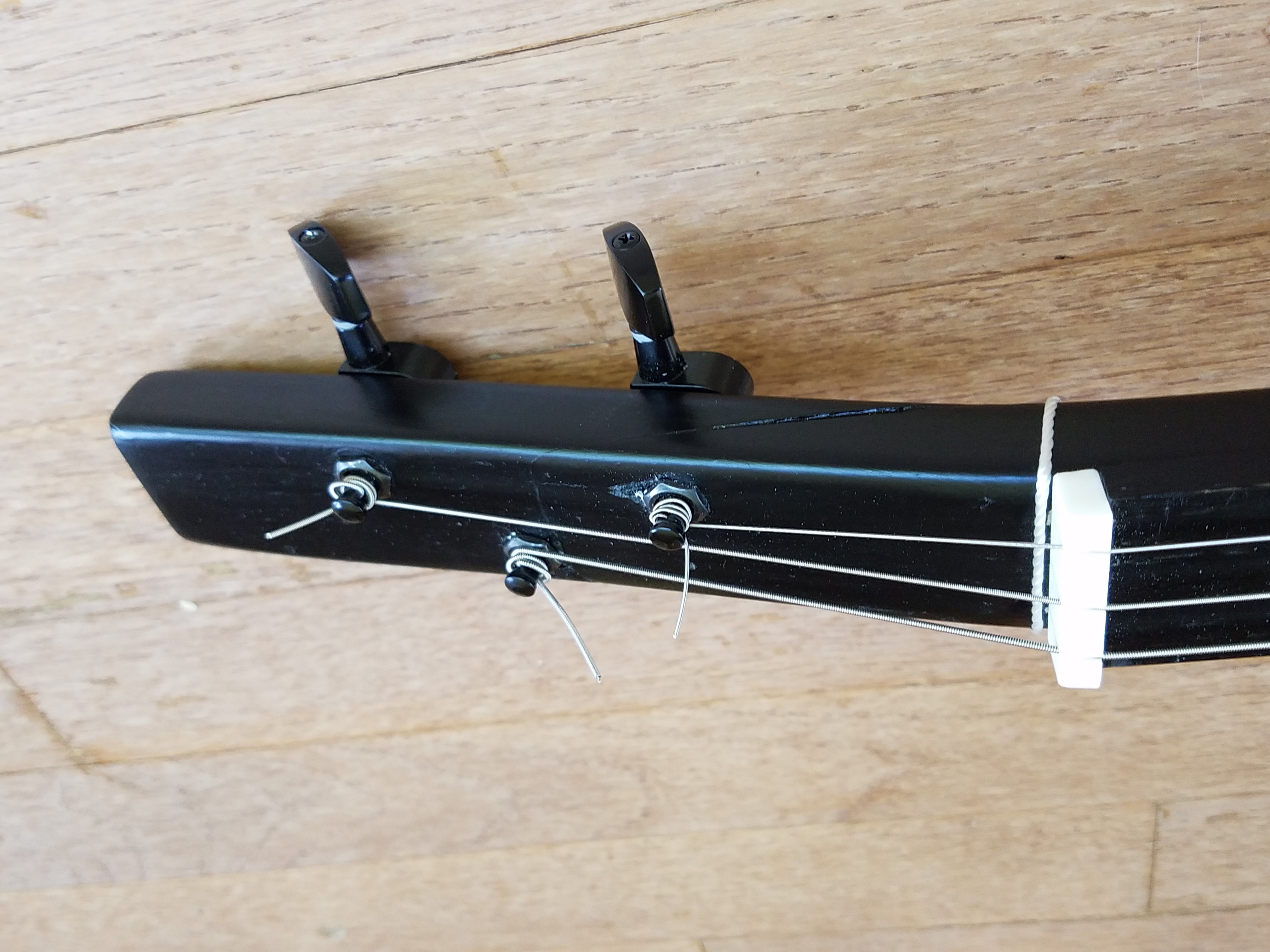 Used a scarf joint to angle the headstock