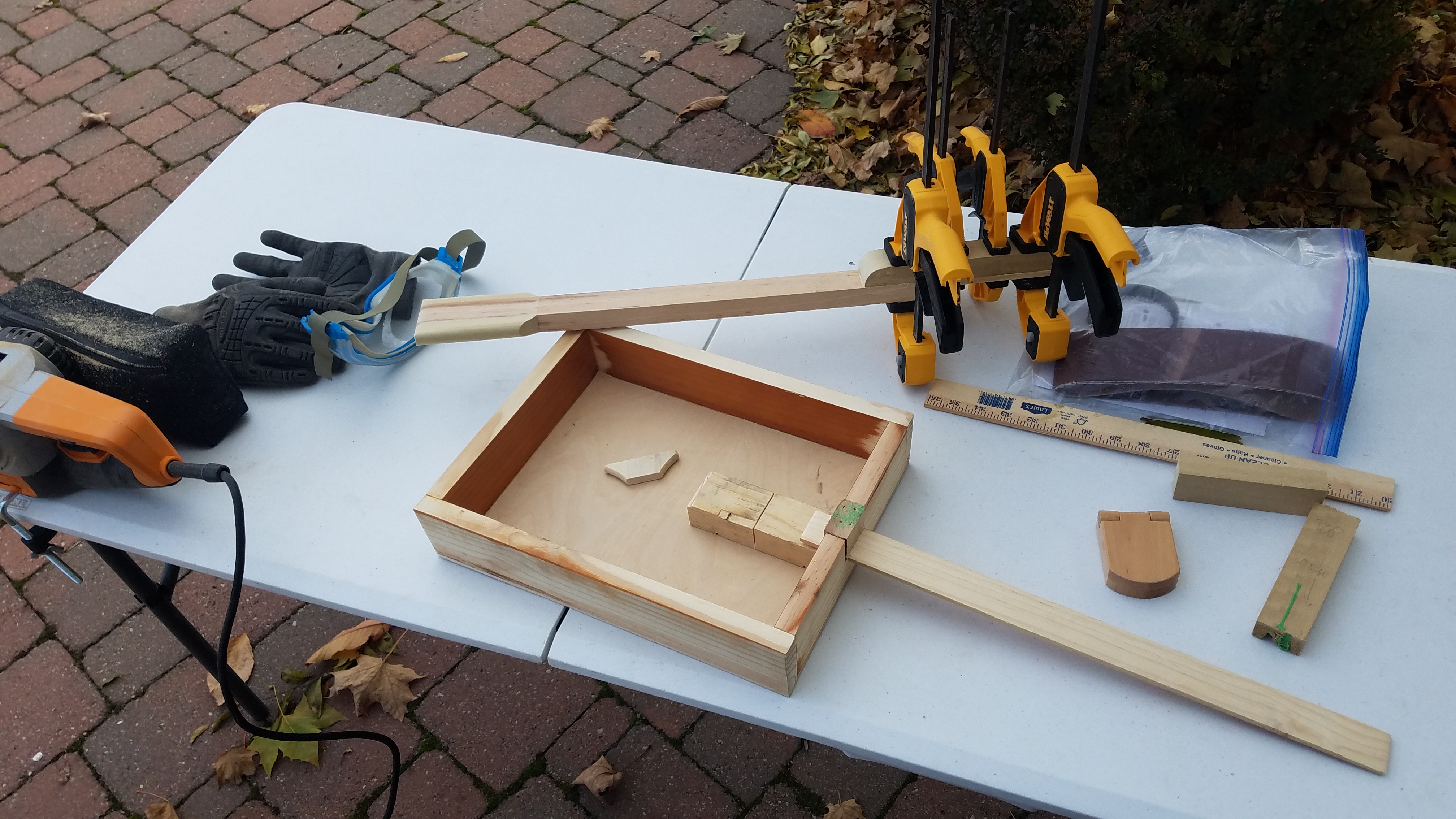 I made the box and neck from scratch. No electric saw was used, just a hand saw