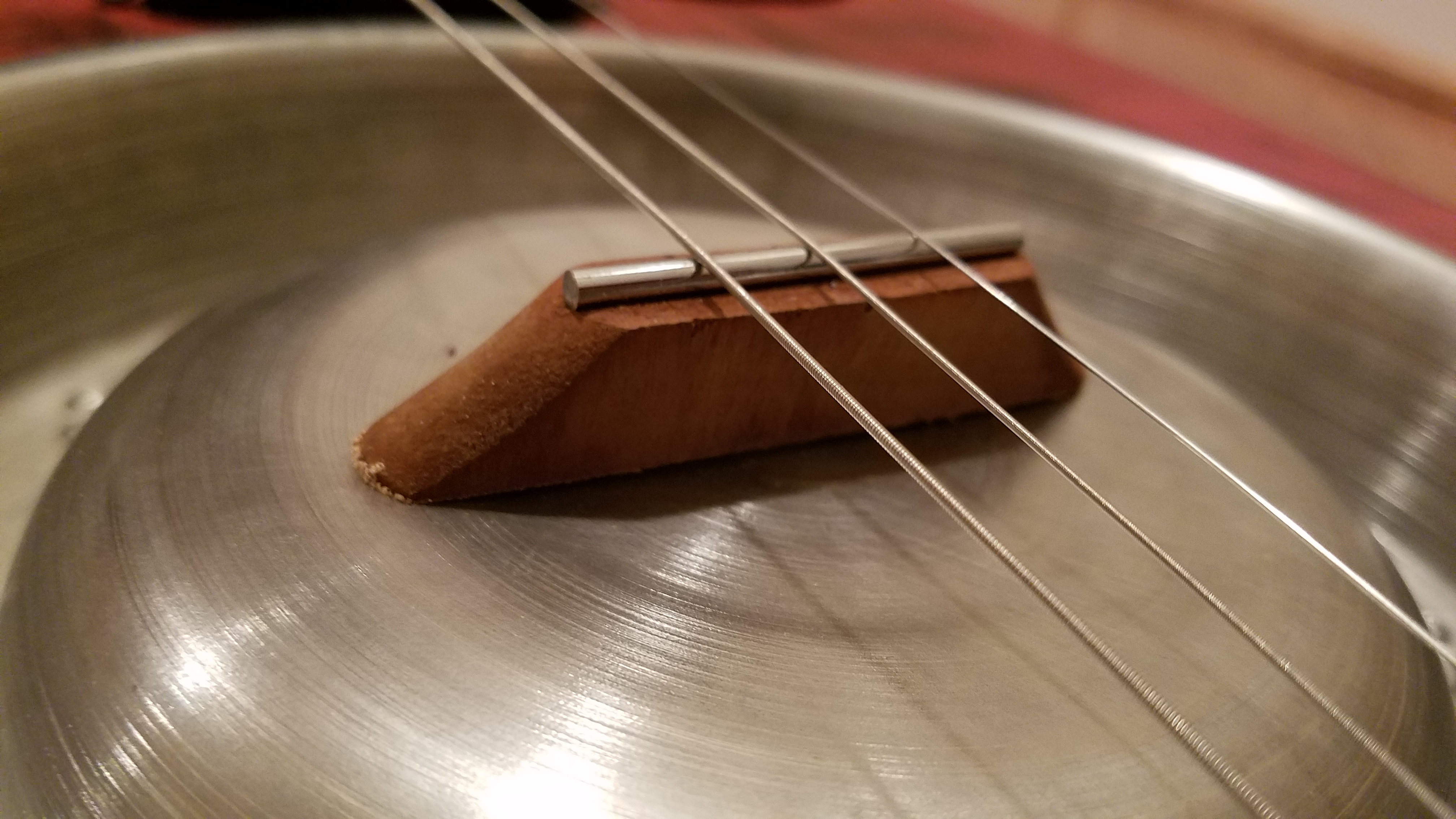 The brige is made from a paint brush after cutting the handle and the part with the bristles