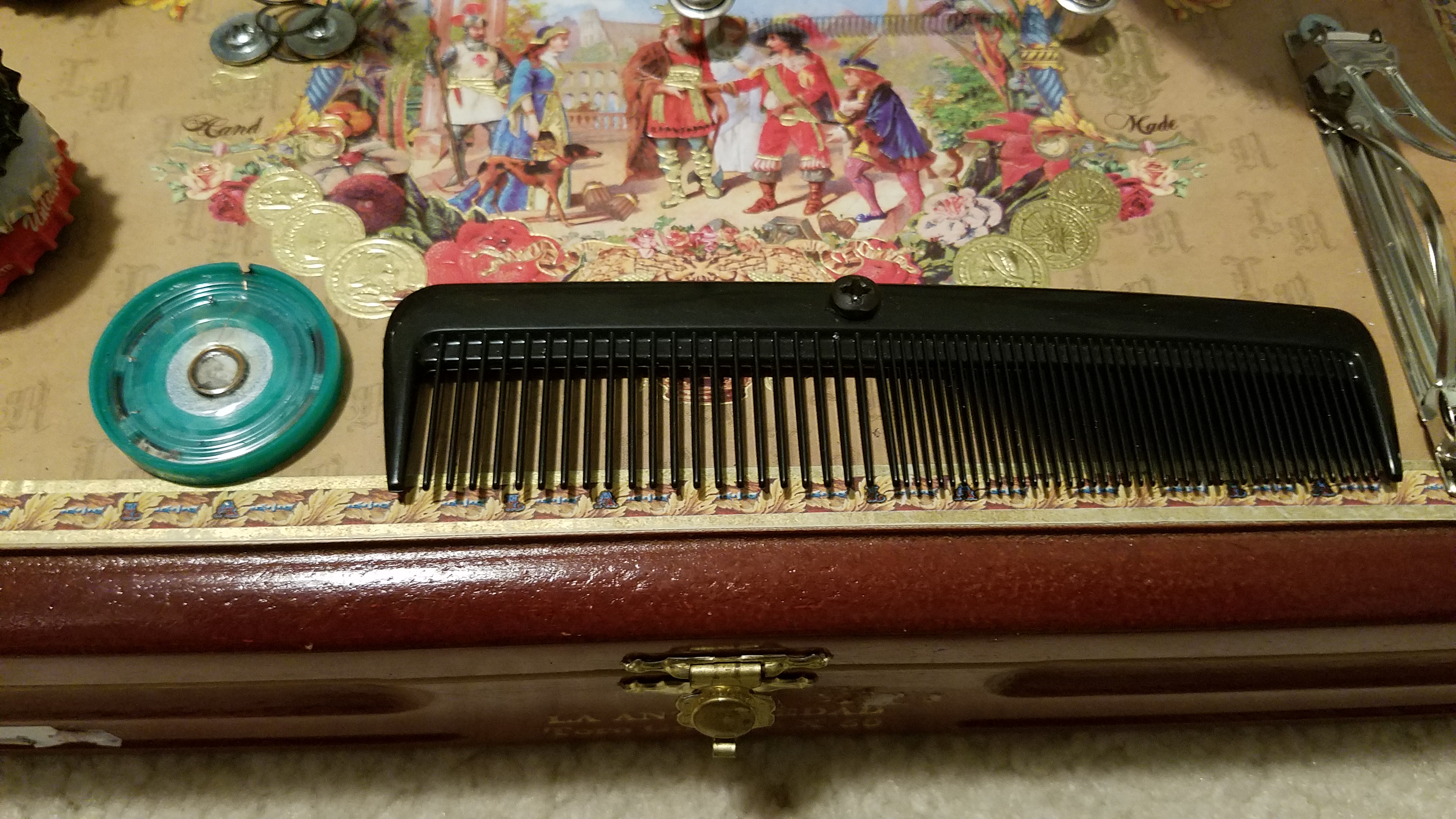 The green circle is a piezo I pulled out of a toy. This one is not plugged in, it just makes a crinkly sound when you hit it